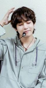 Kim Taehyung of BTS radiates with genuine optimism. bts v wallpaper