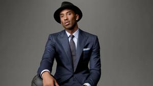 Kobe Bryant is all smiles in a suit kobe bryant wallpaper