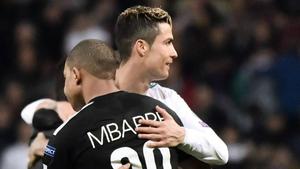 Kylian Mbappe Hugging Cristiano Ronaldo kylian mbappe wallpaper