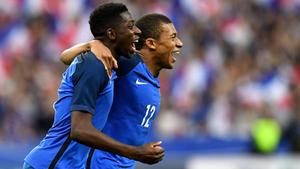 Kylian Mbappe Side-Hugging Teammate