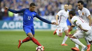 Kylian Mbappe Slipping The Ball kylian mbappe wallpaper