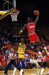 Legendary Michael Jordan showcases his iconic slam dunk michael jordan wallpaper