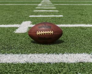 Light up the night with a game of football football wallpaper
