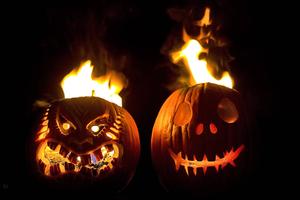 Light Up the Night with Halloween Pumpkins on Fire! halloween wallpaper