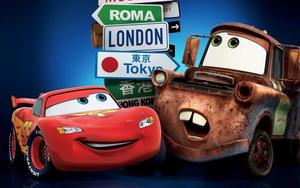 Lightning McQueen zooming on the race track lightning mcqueen wallpaper