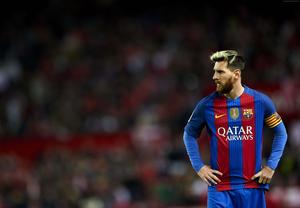 lionel messi is standing on the field messi wallpaper