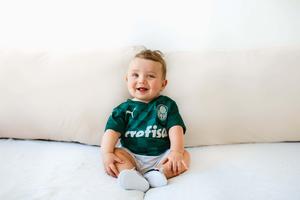 Little Baby Boy Sitting in the Park Smiling baby boy wallpaper