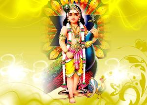 : Lord Murugan standing at the entrance of the temple Wallpaper