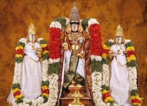 Lord Venkateswara With Two Statues And Garlands lord venkateswara wallpaper
