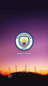 Man City’s Logo Illuminated Against a Magnificent Purple Sky manchester city wallpaper