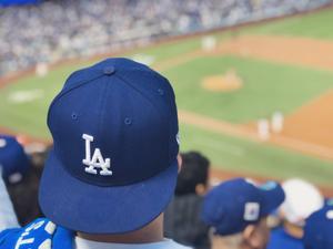 Man Wearing MLB Dodgers Cap Wallpaper