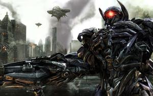 Megatron and Starscream Fly Over the City transformers wallpaper