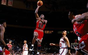 Michael Jordan taking a one-handed shot michael jordan wallpaper