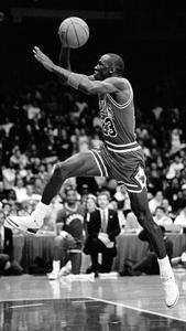Michael Jordan taking flight in an iconic moment michael jordan wallpaper