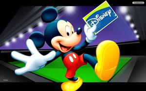 Mickey Mouse takes a break from the Disney Magic. mickey mouse wallpaper