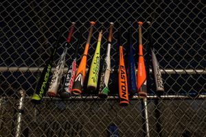 MLB Bats Hung At Field Fence  Wallpaper