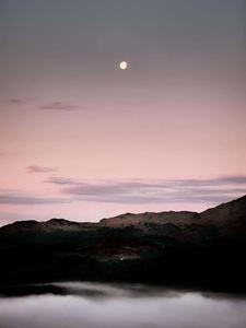 moon rising over a lake with fog ipad wallpaper