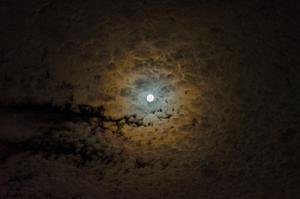 Moonlit clouds illuminated against the night sky moon wallpaper