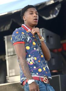 NBA Youngboy delighting his fans with an energetic performance nba youngboy wallpaper