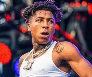 NBA Youngboy Poses in His Signature All-White Outfit nba youngboy wallpaper