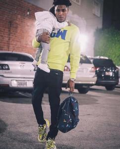 NBA Youngboy rocking his signature dreads and signature style. nba youngboy wallpaper