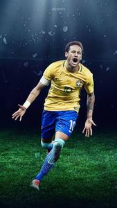 Neymar spills on the pitch, dribbling through defenders. neymar wallpaper