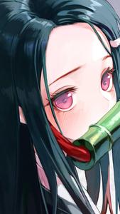 Nezuko Kamado wears a bamboo muzzle to protect herself and those around her nezuko wallpaper