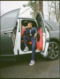NLE Choppa in a stylish pose nle choppa wallpaper