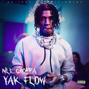 NLE Choppa posing confidently in an urban setting nle choppa wallpaper