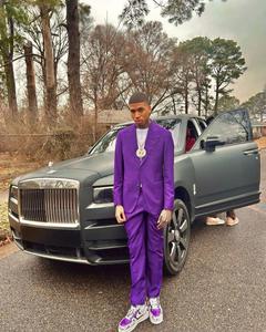 NLE Choppa striking a confident pose nle choppa wallpaper