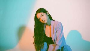 Olivia Rodrigo glistens in the golden sun olivia rodrigo wallpaper