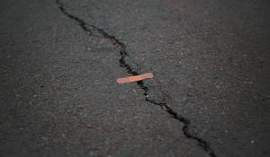 Orange Band Aid On Concrete Surface Crack meme wallpaper