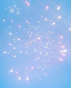 Pastel pale blue hues paint the night sky with spectacular fireworks. blue aesthetic wallpaper