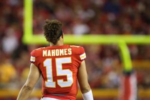 Patrick Mahomes showcasing his powerful throwing arm patrick mahomes wallpaper