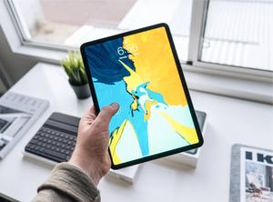 Person Holding Apple iPad Pro ipad wallpaper