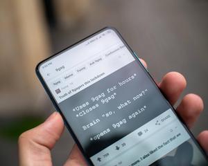 Person Holding Black Android Smartphone meme wallpaper