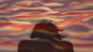 PFP Aesthetic Woman In Rainbow Waves pfp aesthetic wallpaper