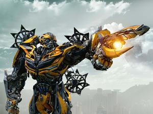 Powerful allies: Optimus Prime and Bumblebee team up to protect Earth in Transformers. transformers wallpaper