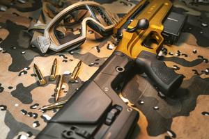 Powerful Intricacy - A Close up of a Gun and Bullets gun wallpaper