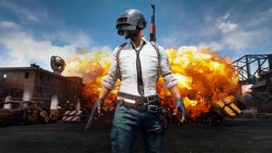 pubg mobile - a man standing in front of an explosion pubg wallpaper