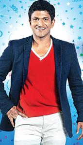 Puneeth Rajkumar Festive Blue Background puneeth rajkumar wallpaper