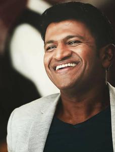 Puneeth Rajkumar Happy Portrait puneeth rajkumar wallpaper