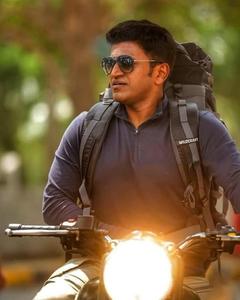 Puneeth Rajkumar Riding Motorcycle puneeth rajkumar wallpaper