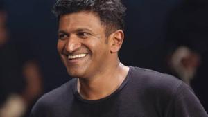 Puneeth Rajkumar Smiling puneeth rajkumar wallpaper