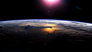 Purple Light Over Earth Horizon Background earth wallpaper