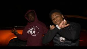 Rapper Nba Youngboy and friend, Kodak Black embrace in a celebratory hug. nba youngboy wallpaper