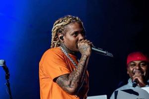 Rapper Performingon Stagewith Microphone king von and lil durk wallpaper
