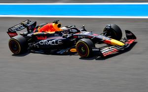 red bull racing car on a track f1 wallpaper