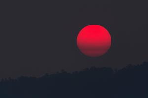 Red Moon Light Shining Through the Black Screen black screen wallpaper