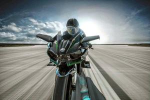 Rider Runs Kawasaki H2r Under Bright kawasaki h2r wallpaper